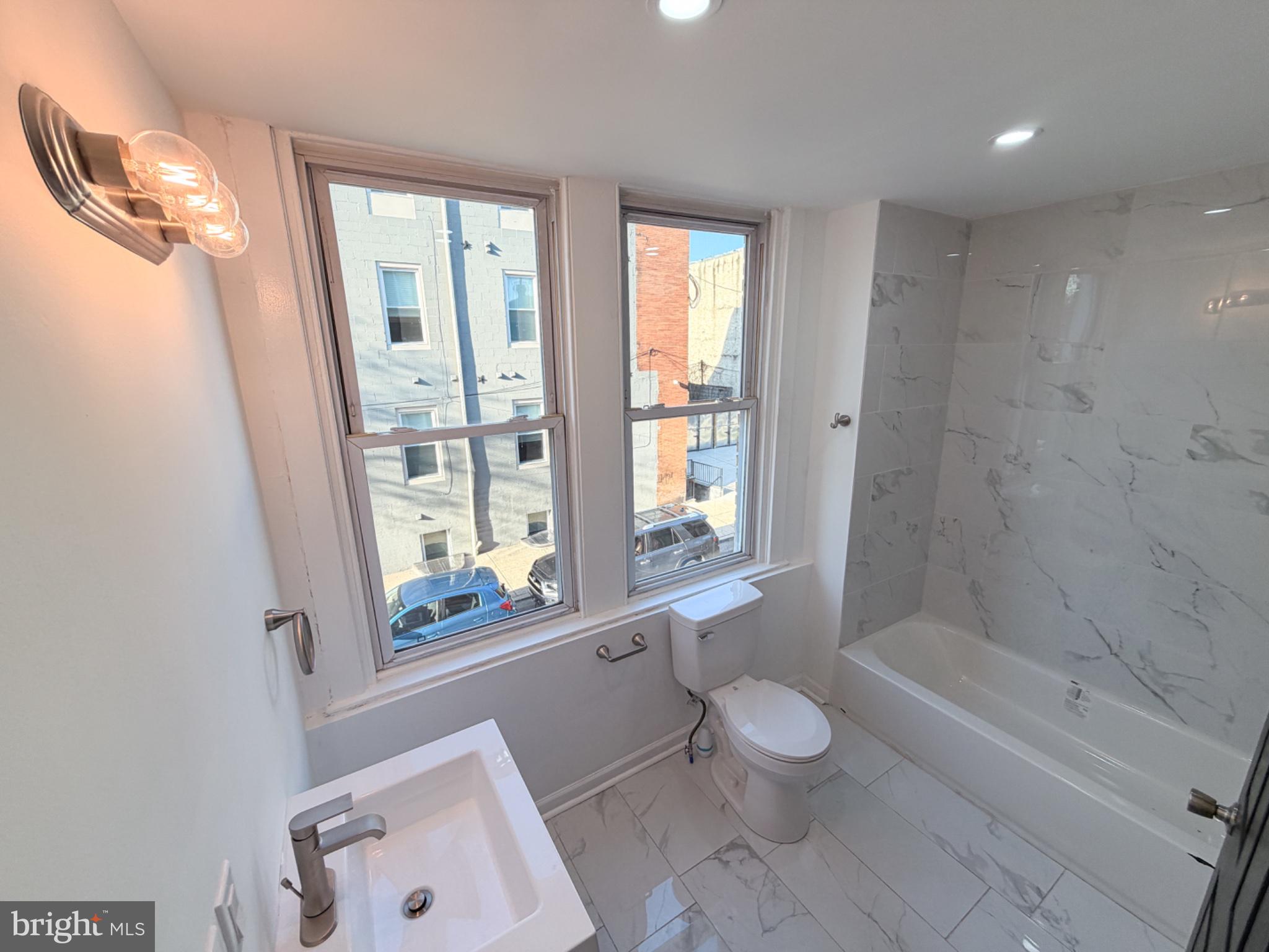 1621 North 33rd Street, Unit 2 Philadelphia, PA 19121 - Photo 3 of 6 Bright and airy modern bathroom retreat.