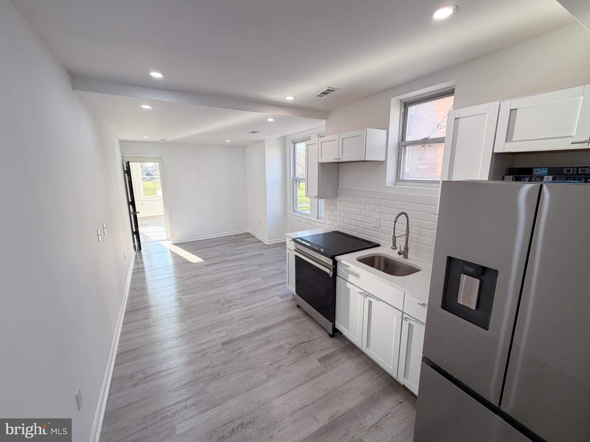 1621 North 33rd Street, Unit 2 Philadelphia, PA 19121 - Photo 4 of 6 Bright and modern open kitchen space.