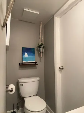 a bathroom with a toilet