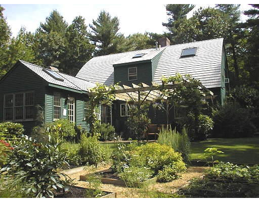20 Woodside Road Harvard, MA 01451 - Photo 1 of 1 a view of a house with backyard and sitting area