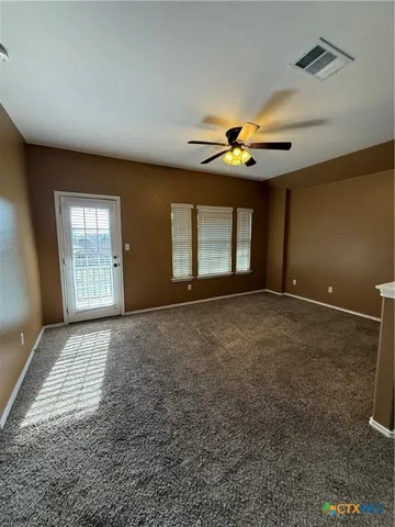 a bathroom with a bathtub sink and mirror