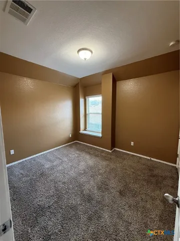 a bathroom with a toilet a sink and bathtub