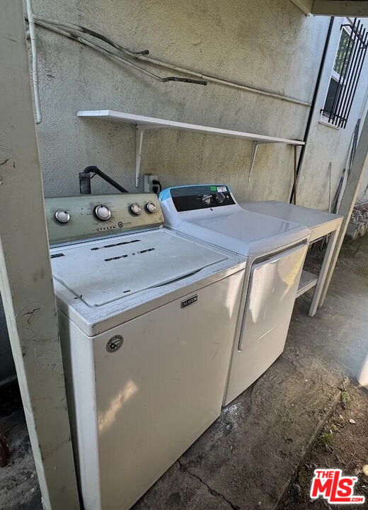 110 South Rampart Boulevard, Unit 3 Los Angeles, CA 90057 - Photo 15 of 17 a utility room with dryer and washer