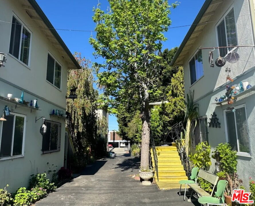 110 South Rampart Boulevard, Unit 3 Los Angeles, CA 90057 - Photo 16 of 17 a view of path along with house and trees