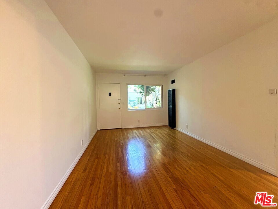 110 South Rampart Boulevard, Unit 3 Los Angeles, CA 90057 - Photo 2 of 17 a view of an empty room and window