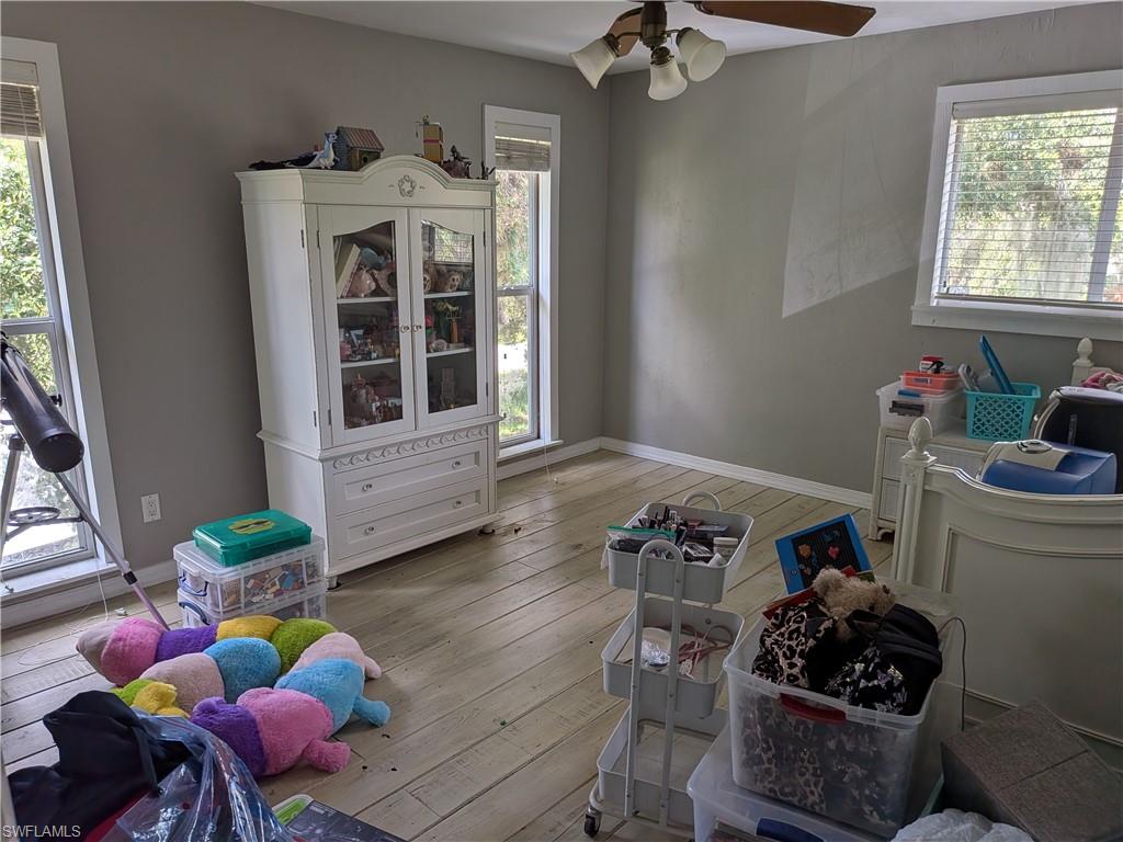 17191 Frank Road Alva, FL 33920 - Photo 16 of 27 a bedroom with furniture toys and a window
