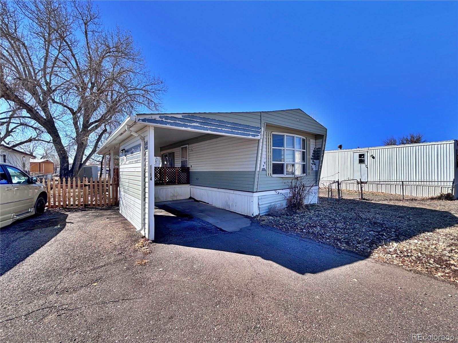 1114 Reed Lane La Junta, CO 81050 - Photo 2 of 26 a view of house with a outdoor space