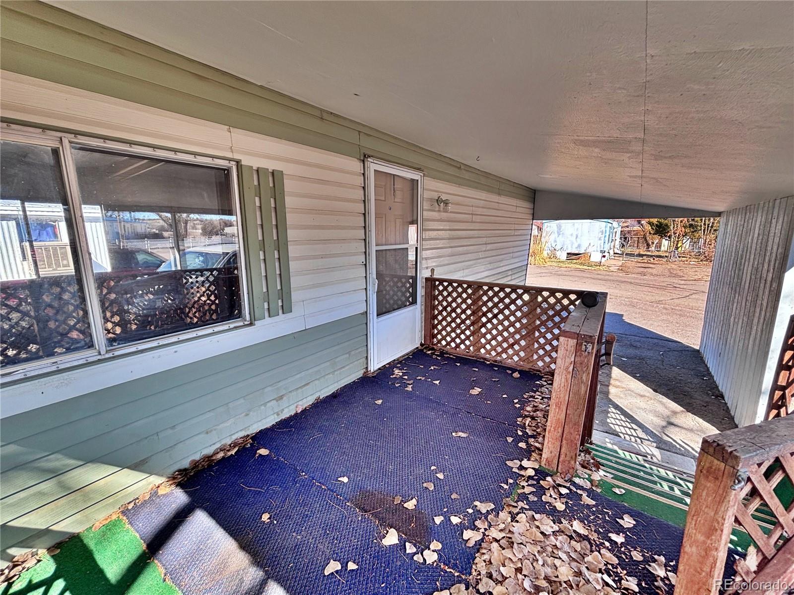 1114 Reed Lane La Junta, CO 81050 - Photo 6 of 22 a view of front door