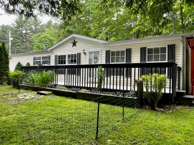 2268 German Hill Road Tionesta, PA 16353 - Photo 2 of 31 a front view of a house with a garden