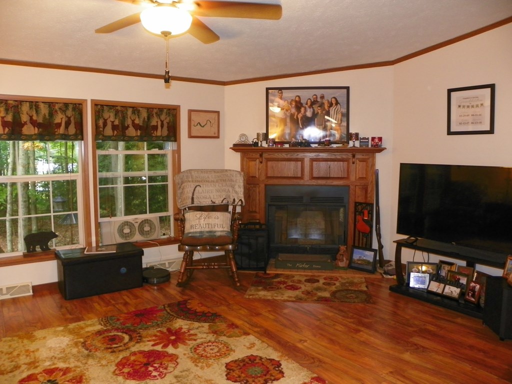 2268 German Hill Road Tionesta, PA 16353 - Photo 5 of 31 a living room with furniture a flat screen tv and a fireplace