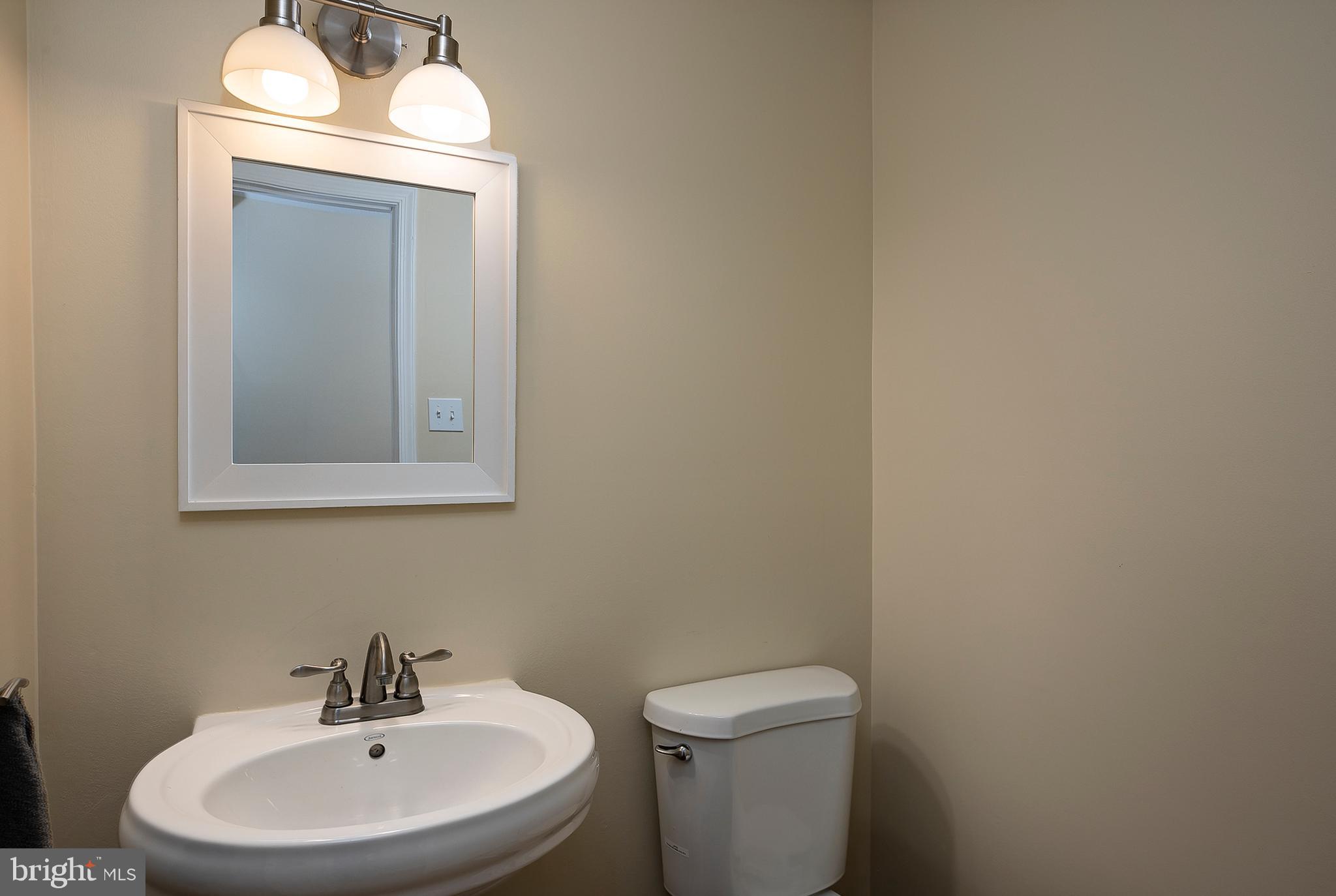 6406 Lookinglass Lane Columbia, MD 21045 - Photo 10 of 41 Charming powder room on main level