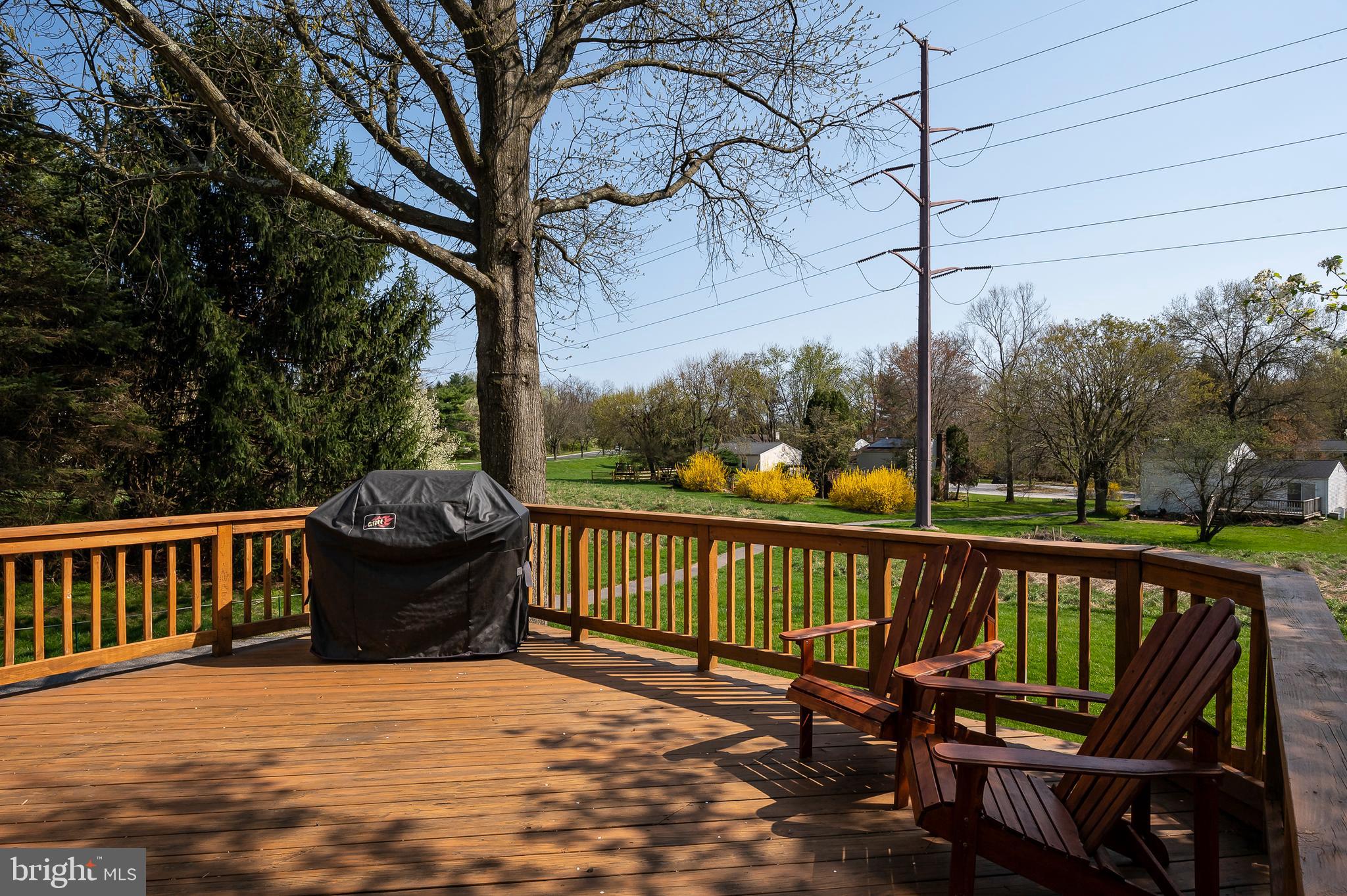 6406 Lookinglass Lane Columbia, MD 21045 - Photo 18 of 41 Grand deck has plenty of space for entertaining