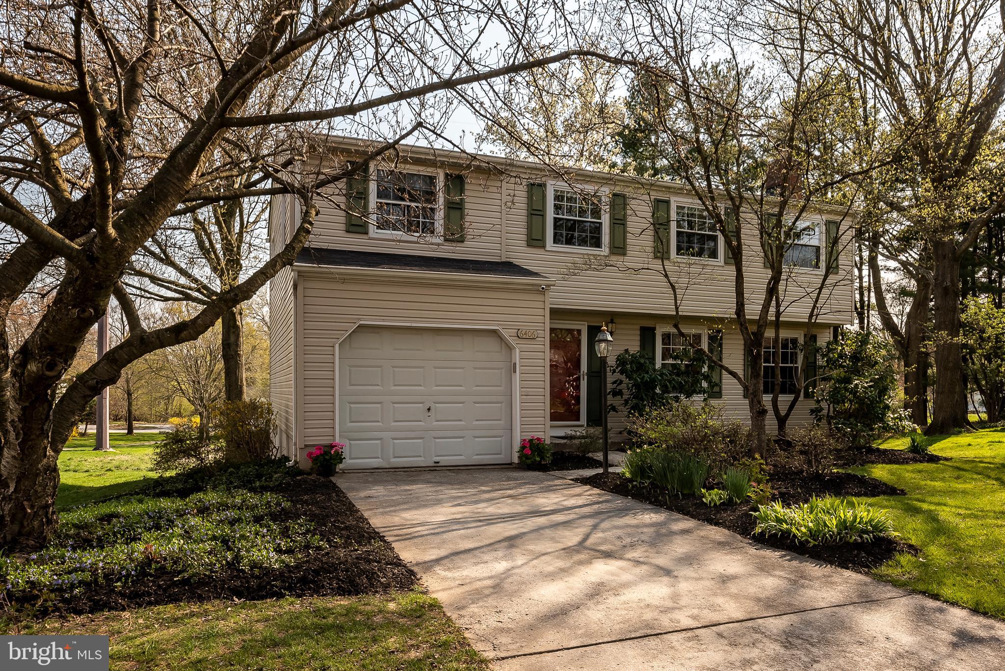 6406 Lookinglass Lane Columbia, MD 21045 - Photo 3 of 41 Landscaped yard and deep attached garage!