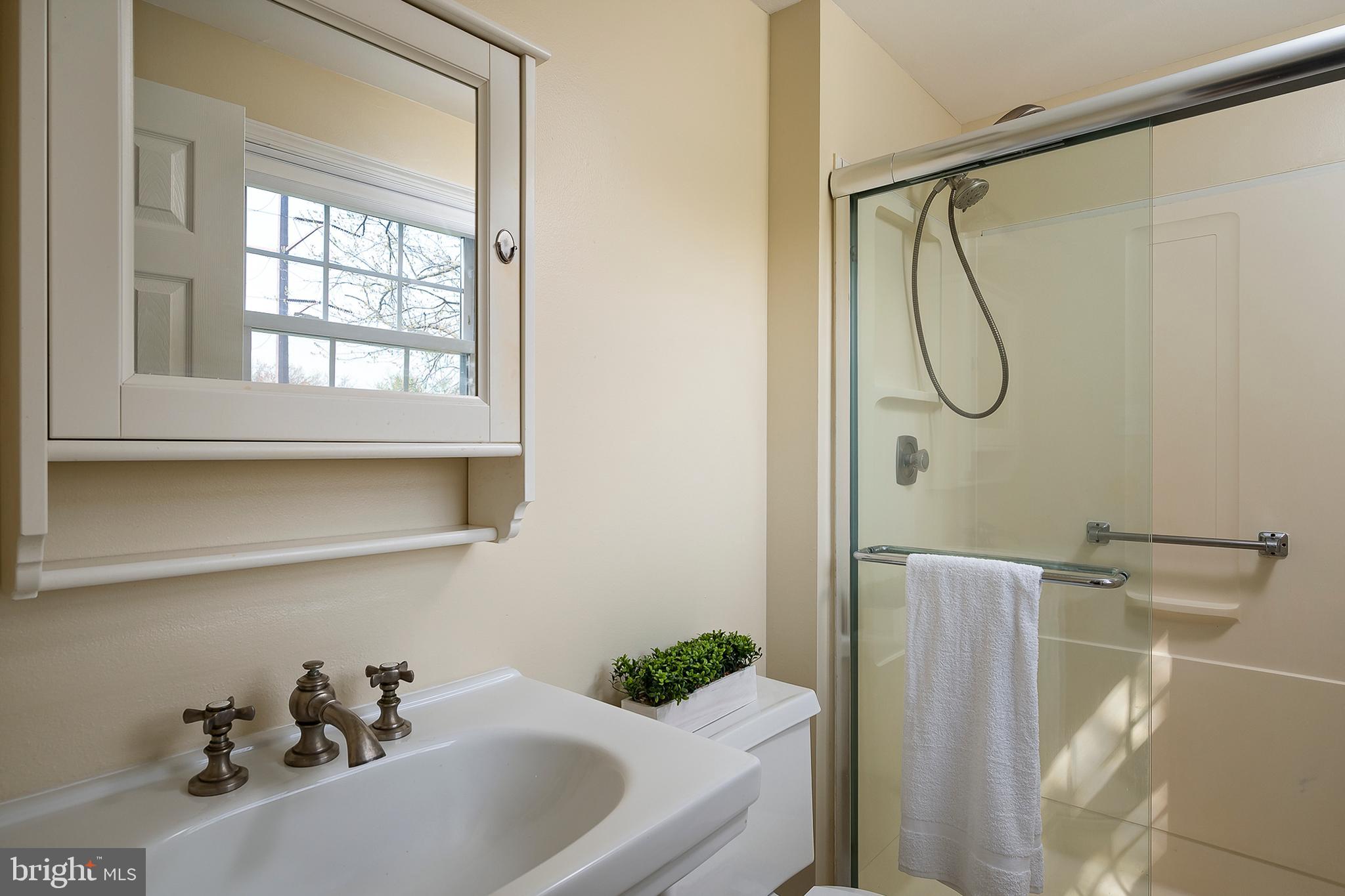 6406 Lookinglass Lane Columbia, MD 21045 - Photo 31 of 41 Primary bath features a stylish glass shower