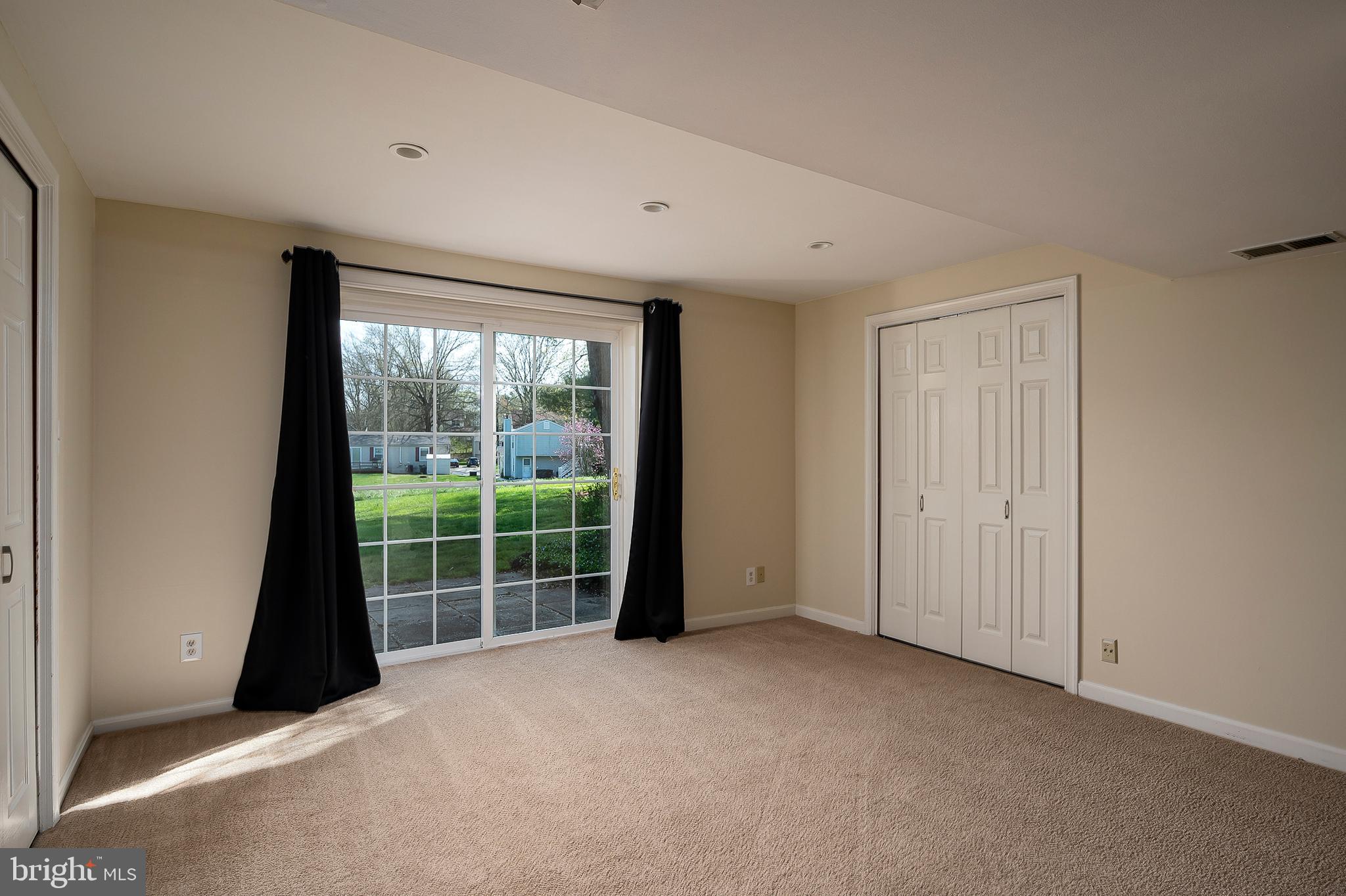6406 Lookinglass Lane Columbia, MD 21045 - Photo 32 of 41 Sunny ground-level walk-out basement