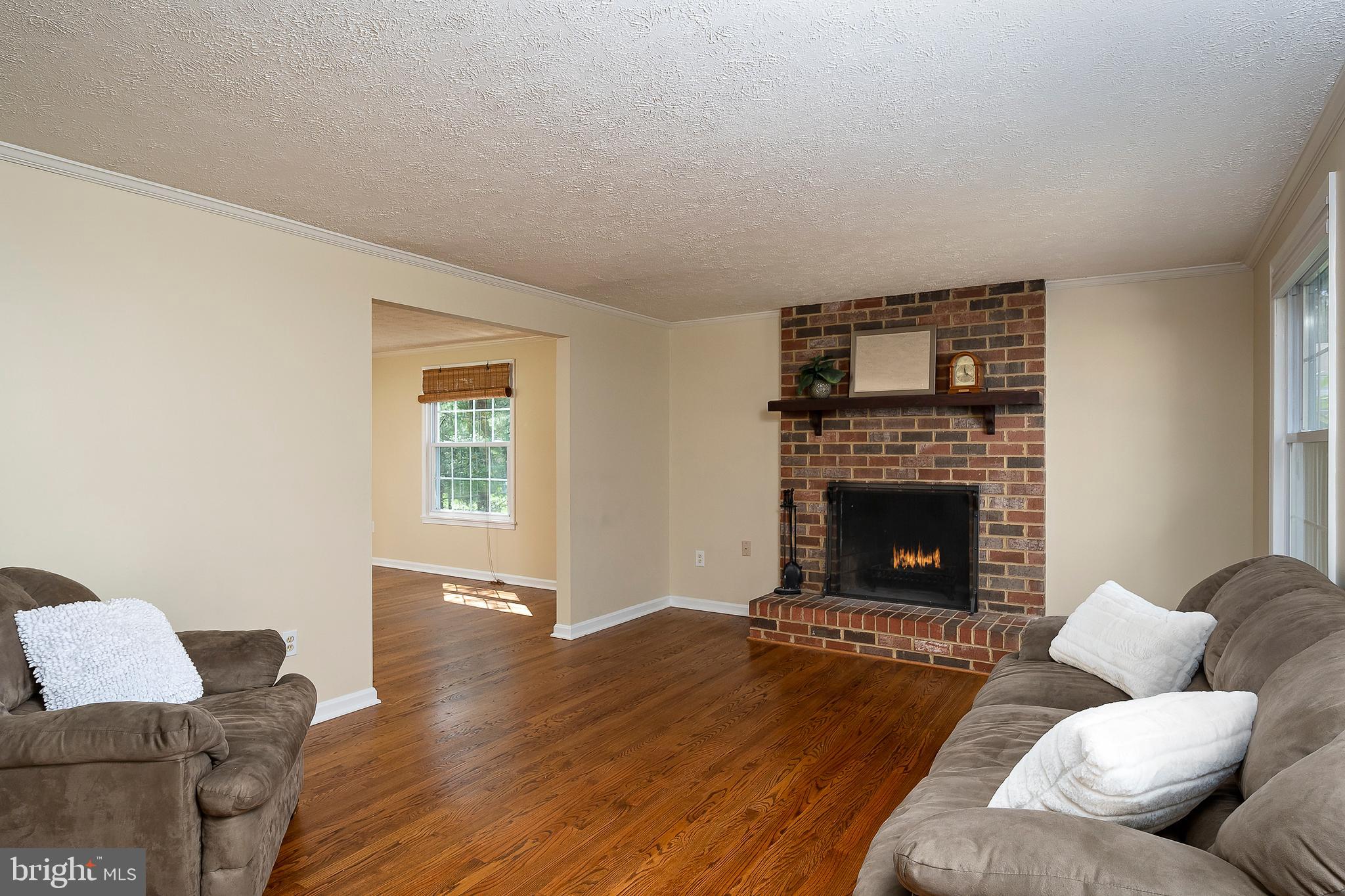 6406 Lookinglass Lane Columbia, MD 21045 - Photo 6 of 41 Boasting a toasty wood-burning fireplace