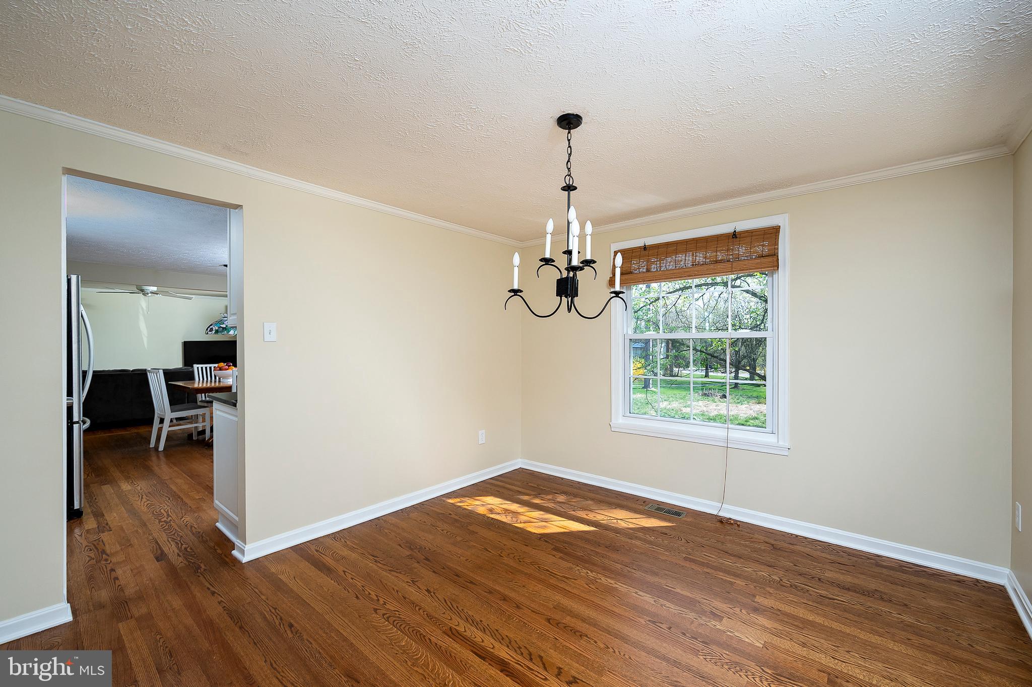 6406 Lookinglass Lane Columbia, MD 21045 - Photo 9 of 41 With elegant crown molding and glistening hardwood