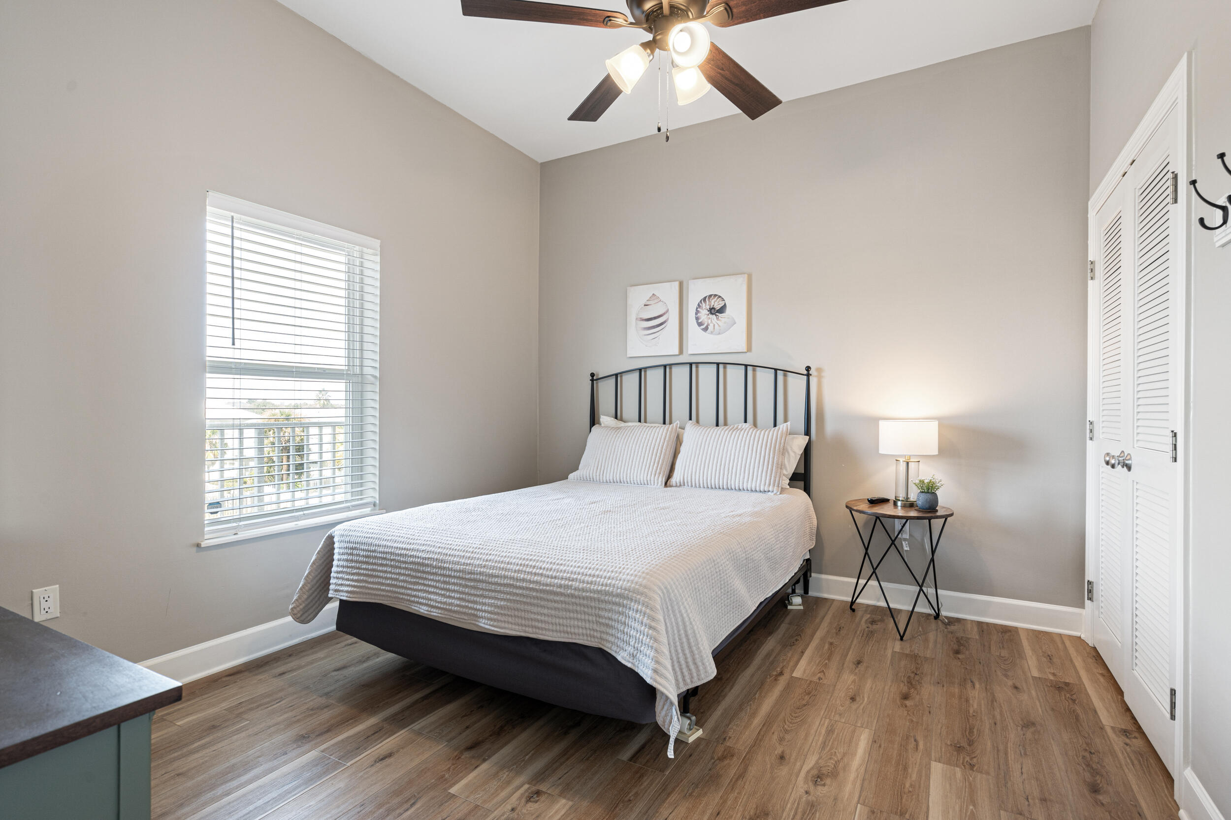 2410 Scenic Gulf Drive, Unit 201C Miramar Beach, FL 32550 - Photo 22 of 39 a bedroom with a bed and a window