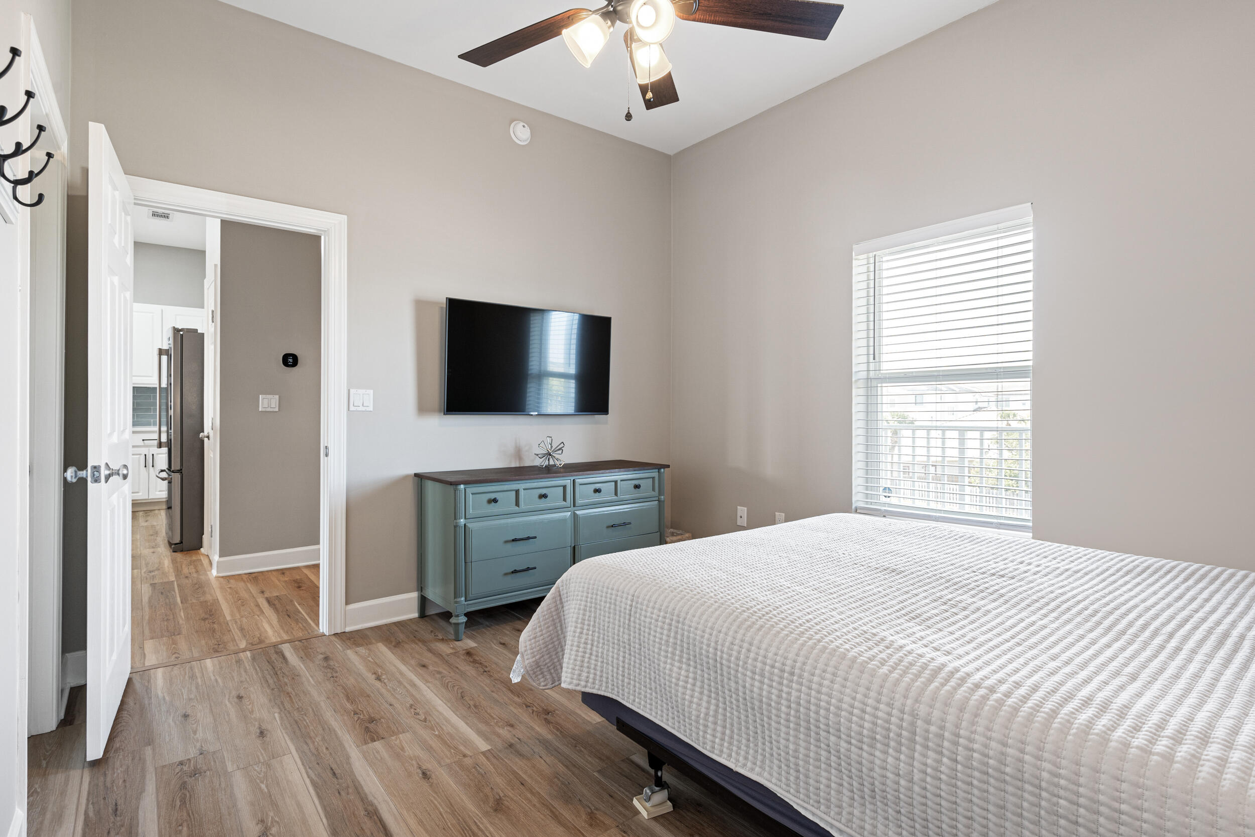 2410 Scenic Gulf Drive, Unit 201C Miramar Beach, FL 32550 - Photo 23 of 39 a bedroom with a bed and a flat screen tv