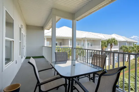 a view of a balcony dining area