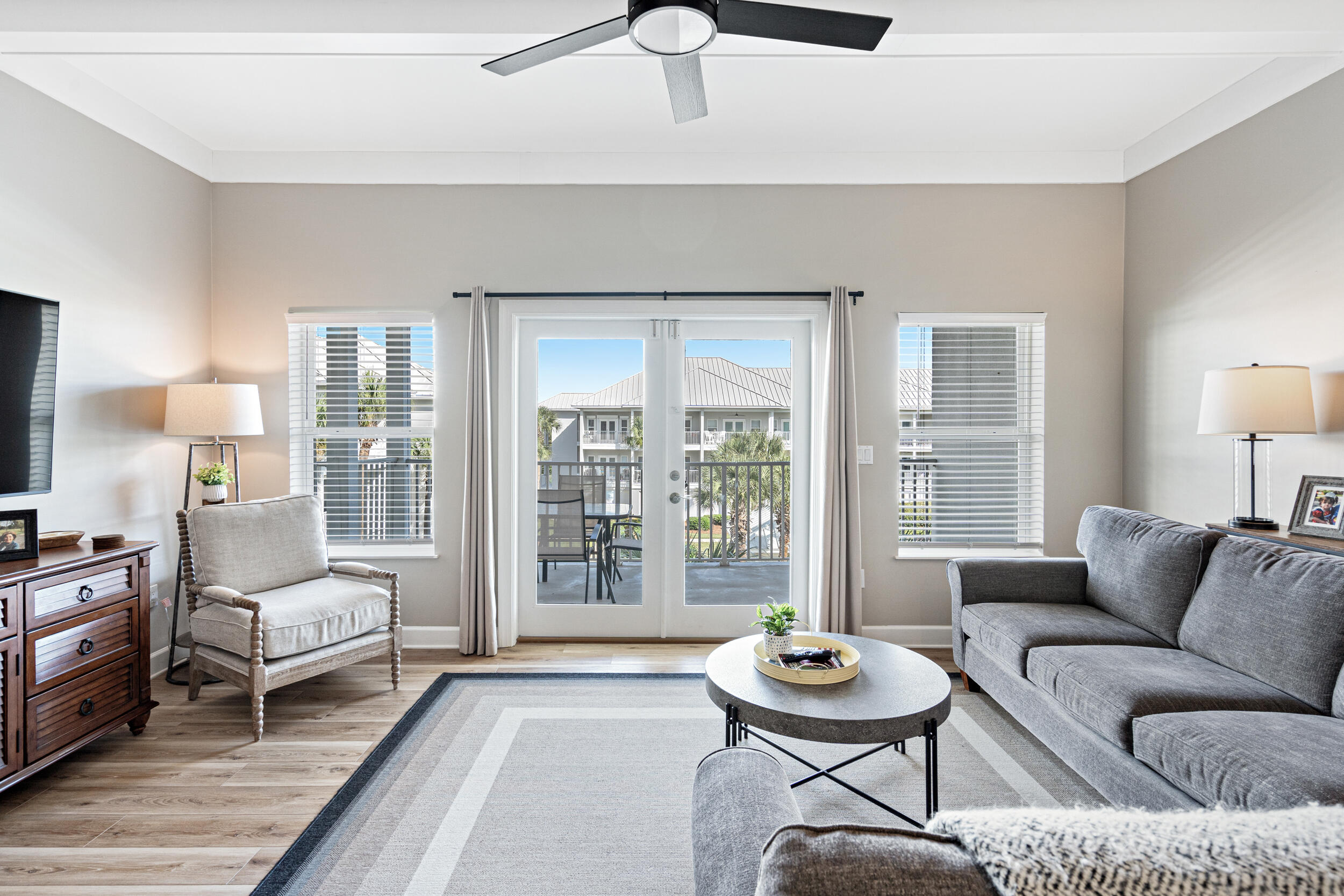 2410 Scenic Gulf Drive, Unit 201C Miramar Beach, FL 32550 - Photo 3 of 39 a living room with furniture and a large window