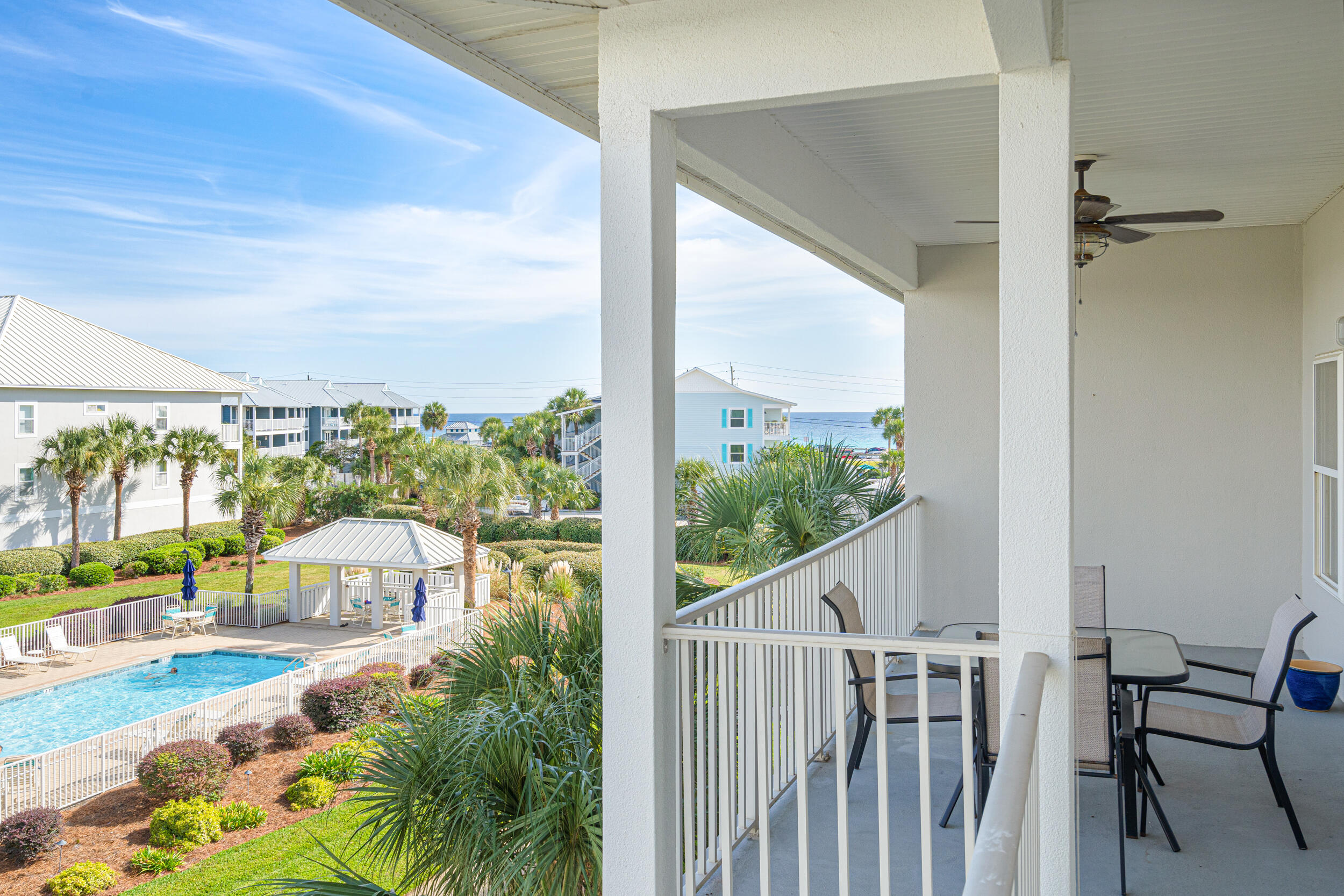 2410 Scenic Gulf Drive, Unit 201C Miramar Beach, FL 32550 - Photo 30 of 39 a view of a balcony with lake view and a floor to ceiling window