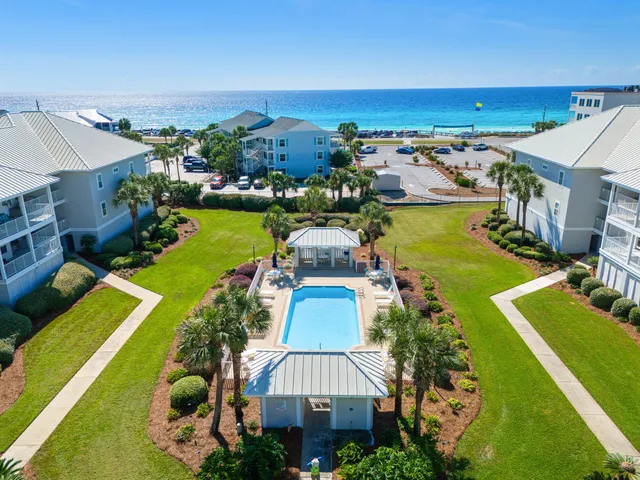 an aerial view of a house with a garden