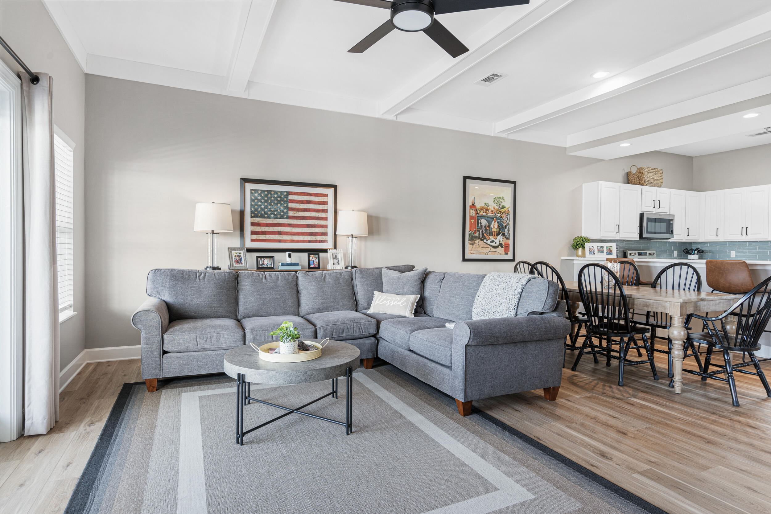 2410 Scenic Gulf Drive, Unit 201C Miramar Beach, FL 32550 - Photo 6 of 39 a living room with furniture and wooden floor