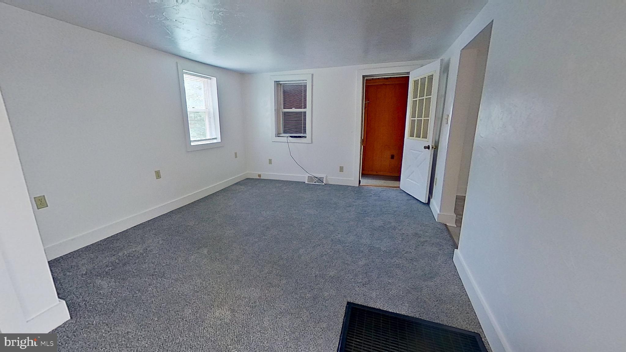 5271 Nursery Road Dover, PA 17315 - Photo 3 of 14 an empty room with windows