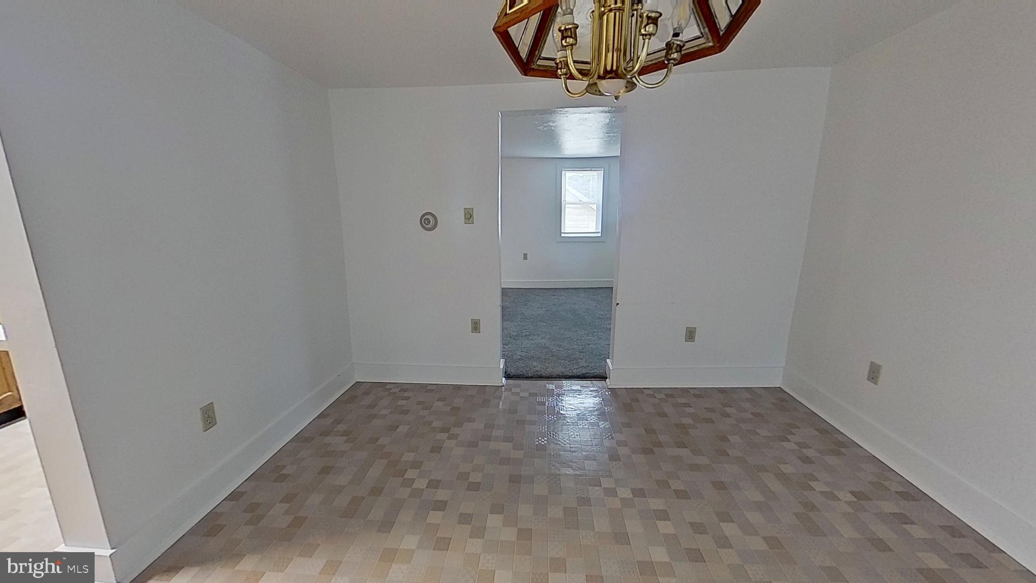 5271 Nursery Road Dover, PA 17315 - Photo 5 of 14 wooden floor in an empty room with a window