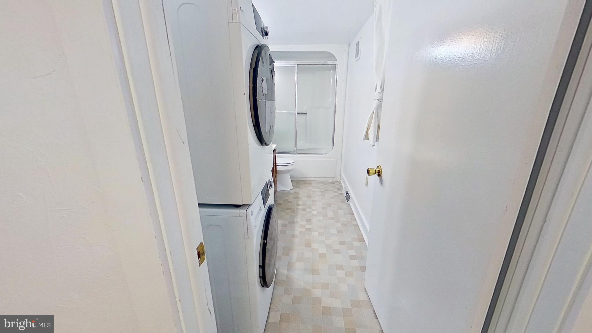 5271 Nursery Road Dover, PA 17315 - Photo 7 of 14 a view of a hallway with wooden floor and staircase