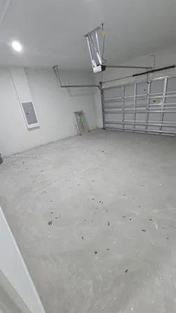 a view of a swimming pool with a yard