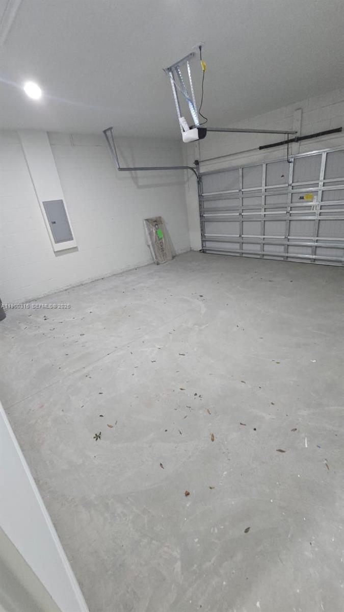 16855 Southwest 18th Avenue Road, Unit 16855 Ocala, FL 34473 - Photo 14 of 16 a view of a garage