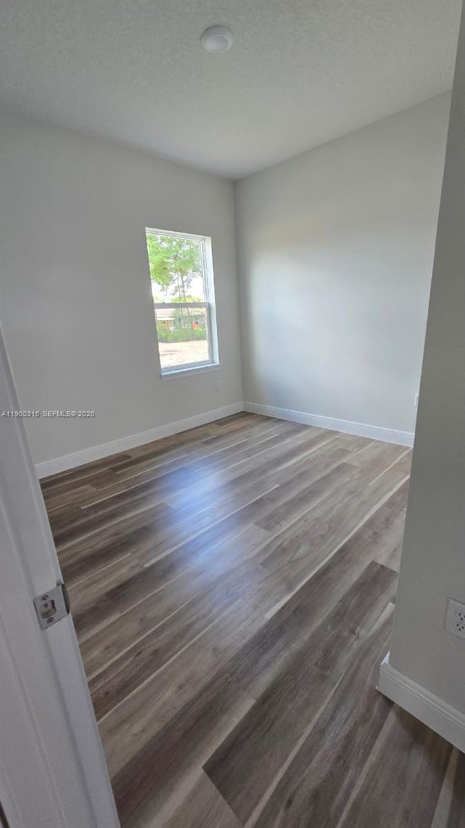 16855 Southwest 18th Avenue Road, Unit 16855 Ocala, FL 34473 - Photo 4 of 16 a view of an empty room and window