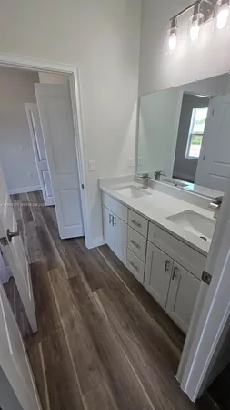 a bathroom with a toilet and a bathtub