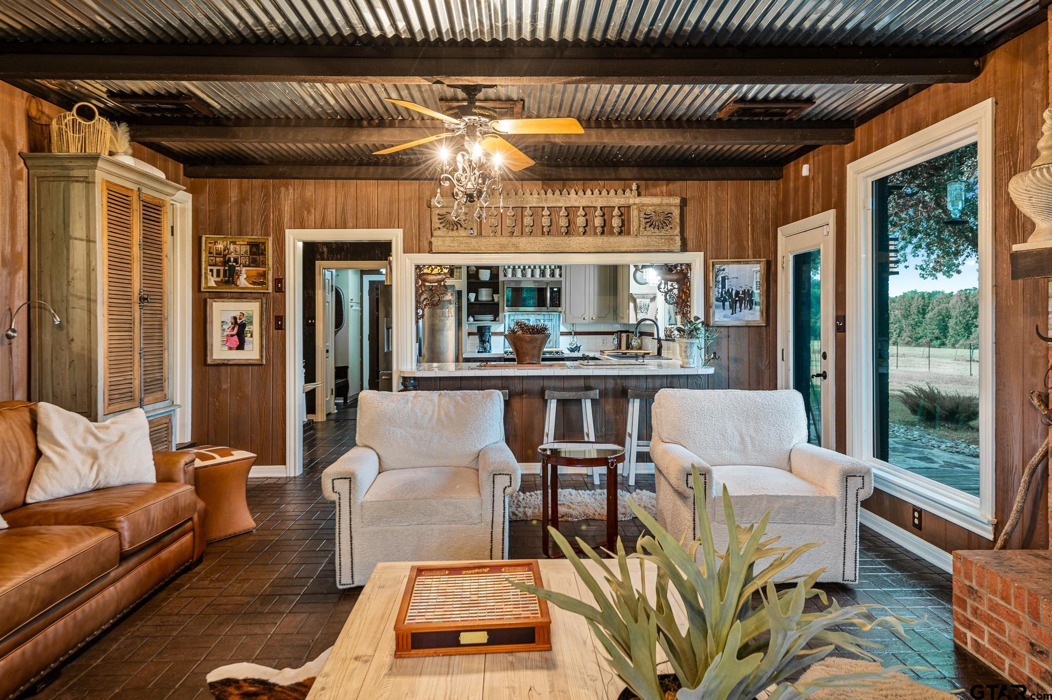 668 County Road 108 Carthage, TX 75633 - Photo 18 of 42 a living room with furniture and a large window