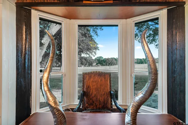 a view of a entryway door with wooden floor