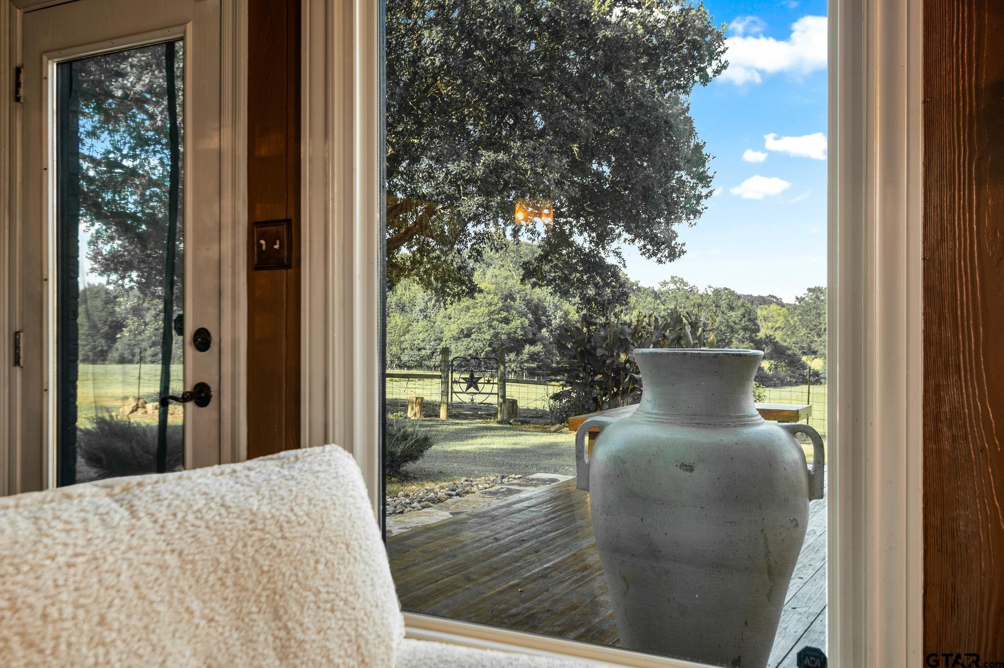 668 County Road 108 Carthage, TX 75633 - Photo 20 of 42 a view of balcony and yard