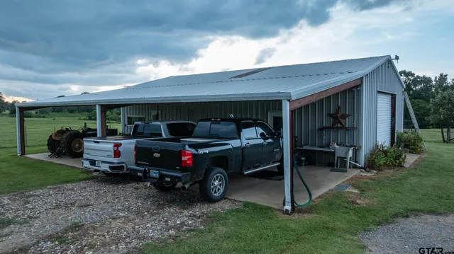 a car parked in front of a house