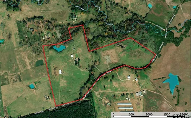 an aerial view of a tennis court