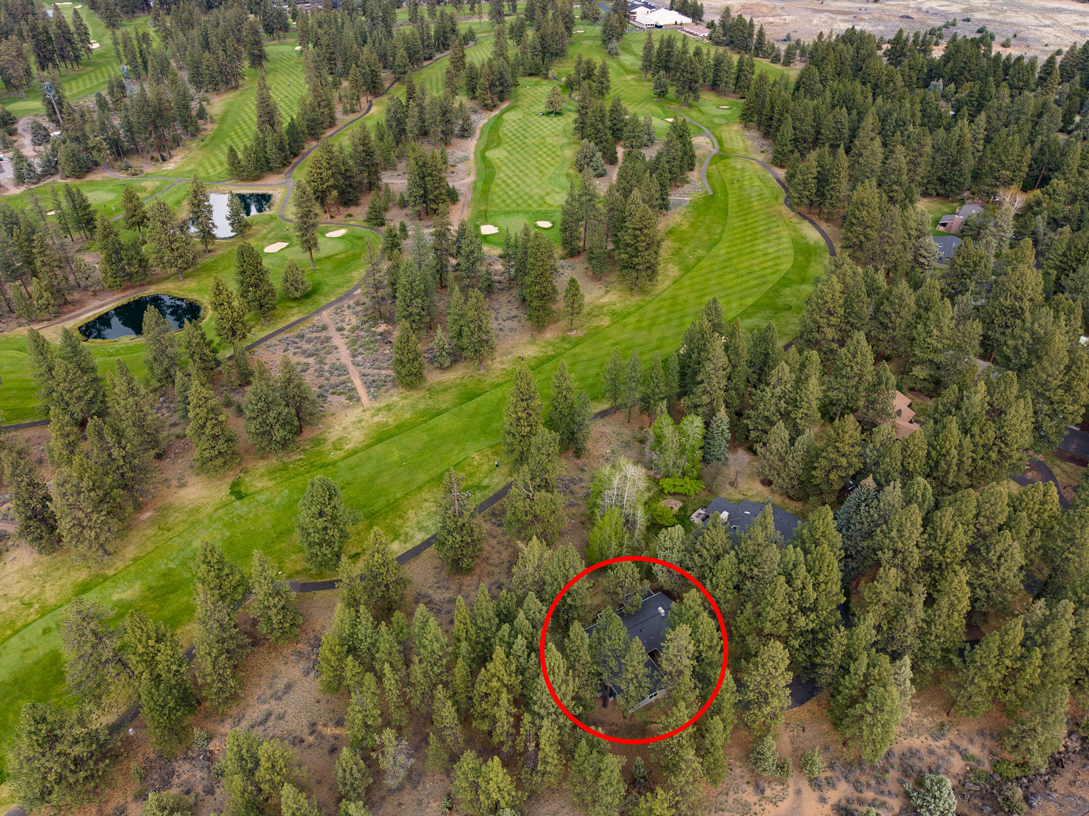 20316 Donkey Sled Road Bend, OR 97702 - Photo 40 of 50 an aerial view of residential house with an outdoor space and trees