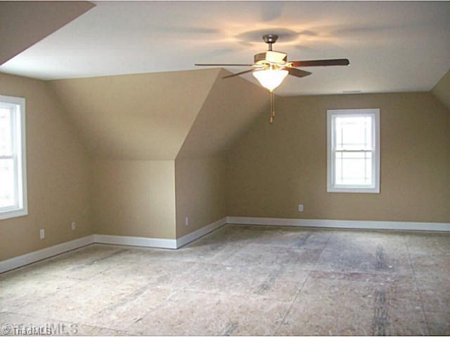 5628 Cape Fox Drive Oak Ridge, NC 27310 - Photo 13 of 16 Bonus. Abundantly sized bonus room.