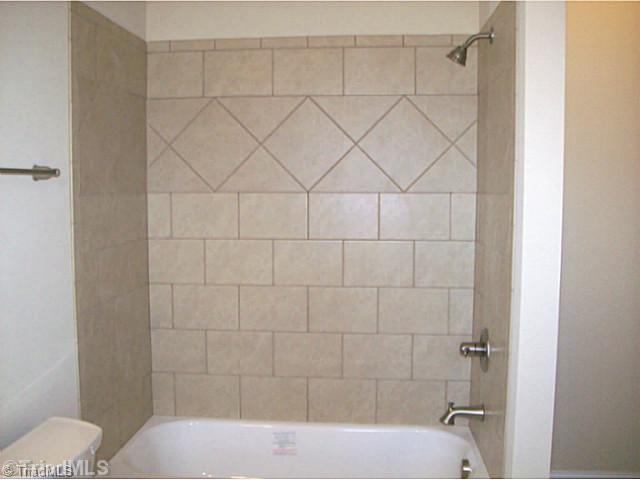5628 Cape Fox Drive Oak Ridge, NC 27310 - Photo 16 of 16 Bath. Every bedroom has it s own private bath. All full baths have tile floors and custom tub surround tile.