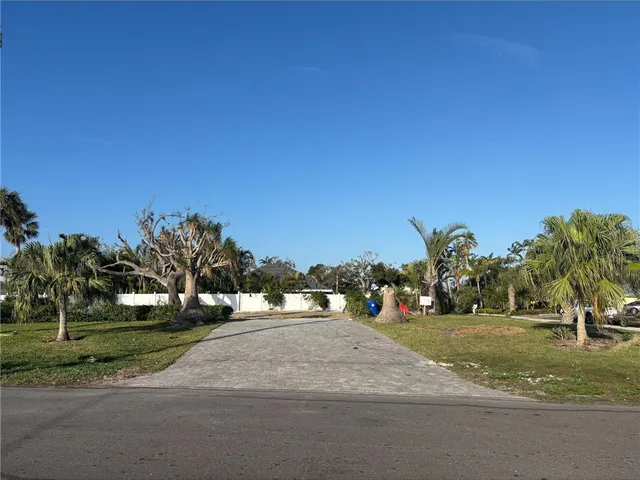 a view of a playground with basketball court