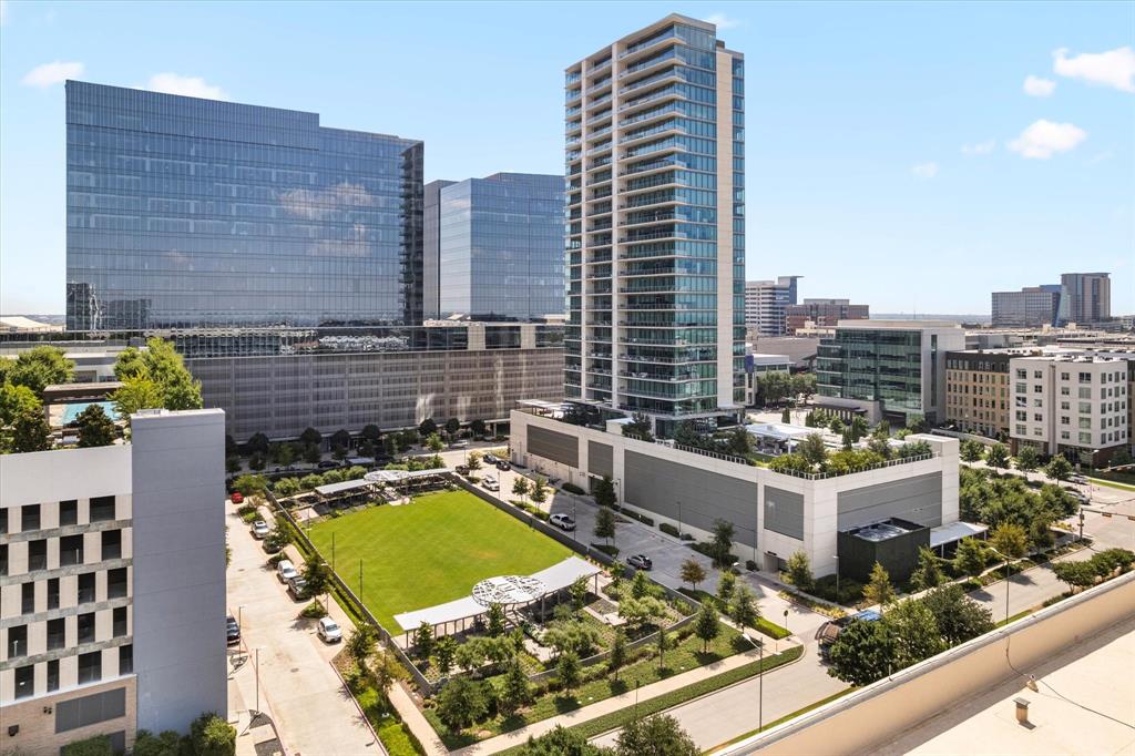 a view of city with tall buildings