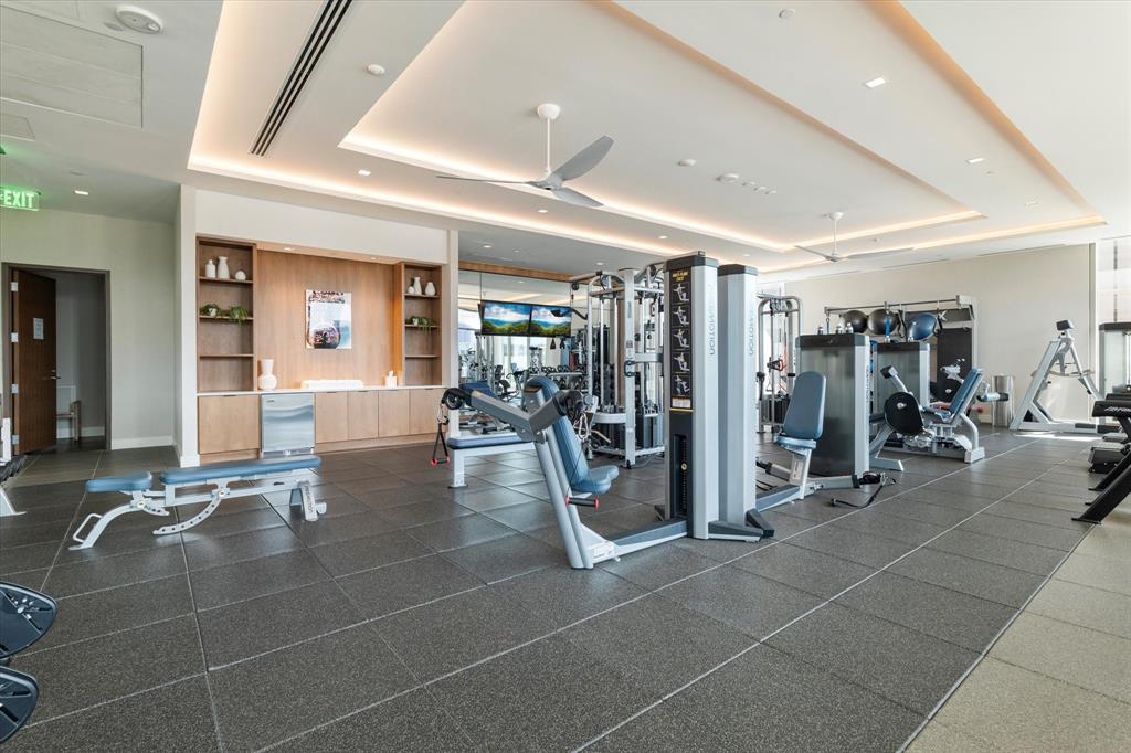 7901 Windrose Avenue, Unit 1701 Plano, TX 75024 - Photo 32 of 40 a lobby with furniture and lots of glass door