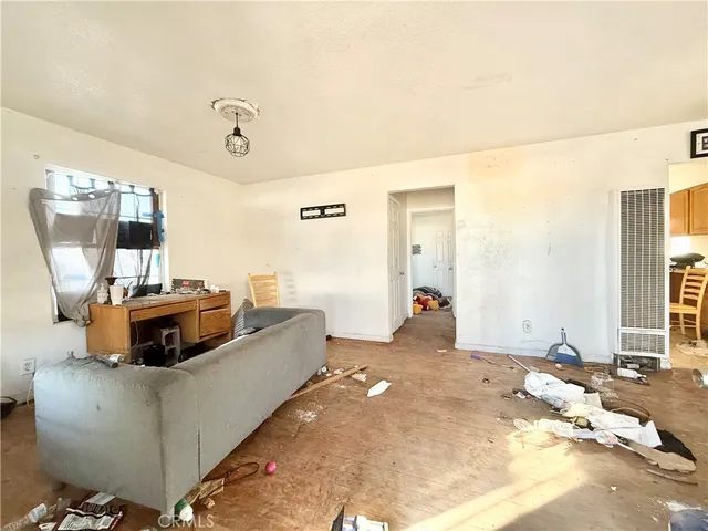 a kitchen with stainless steel appliances stove refrigerator sink and cabinets