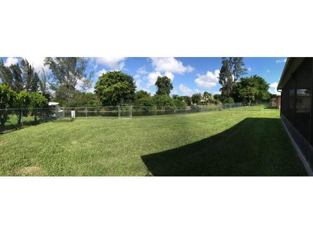 22250 Garrison Street Boca Raton, FL 33428 - Photo 7 of 26 a black and white photo of a field