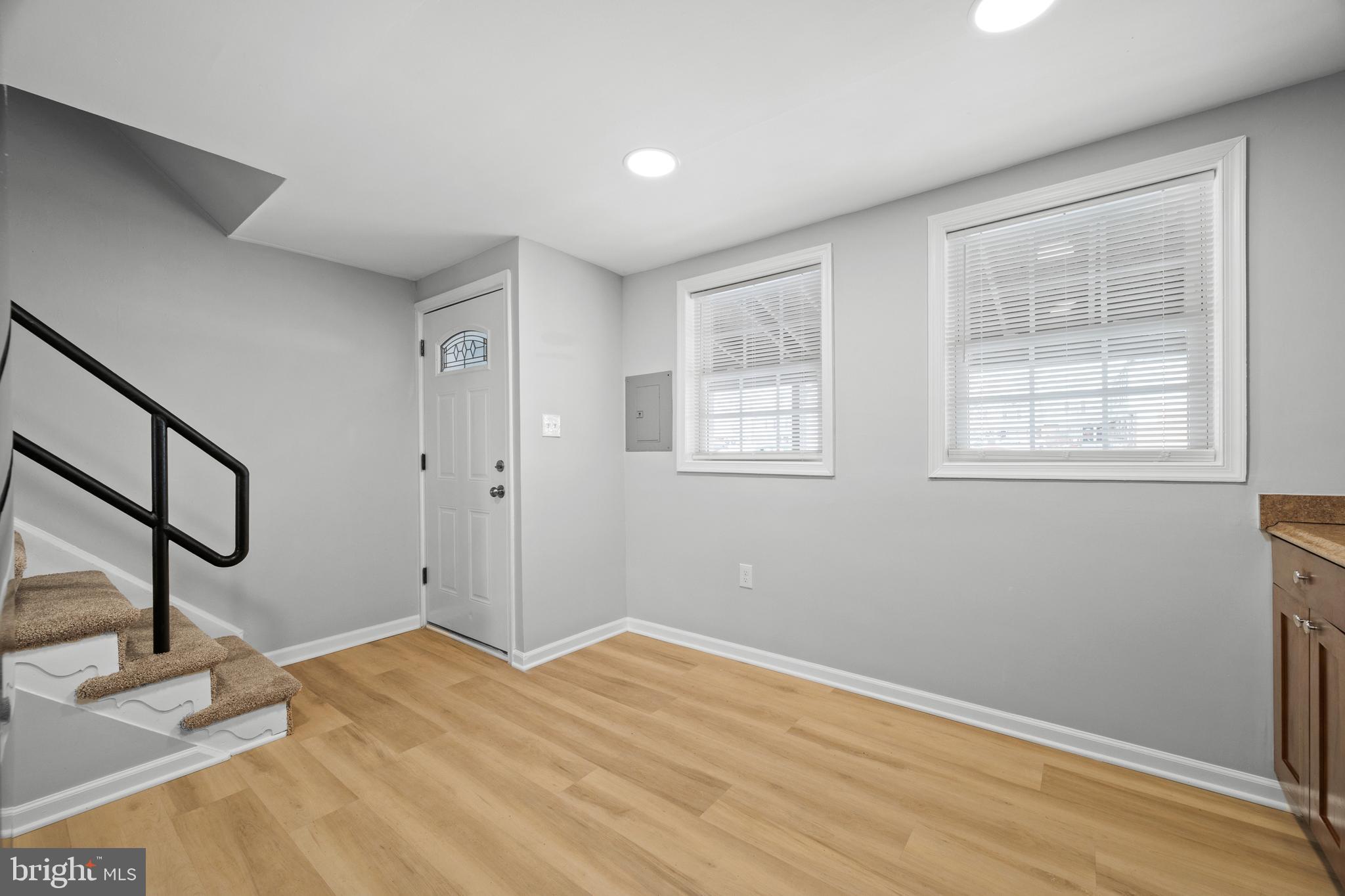 817 5th Baltimore, MD 21227 - Photo 14 of 29 a view of empty room with wooden floor and fan