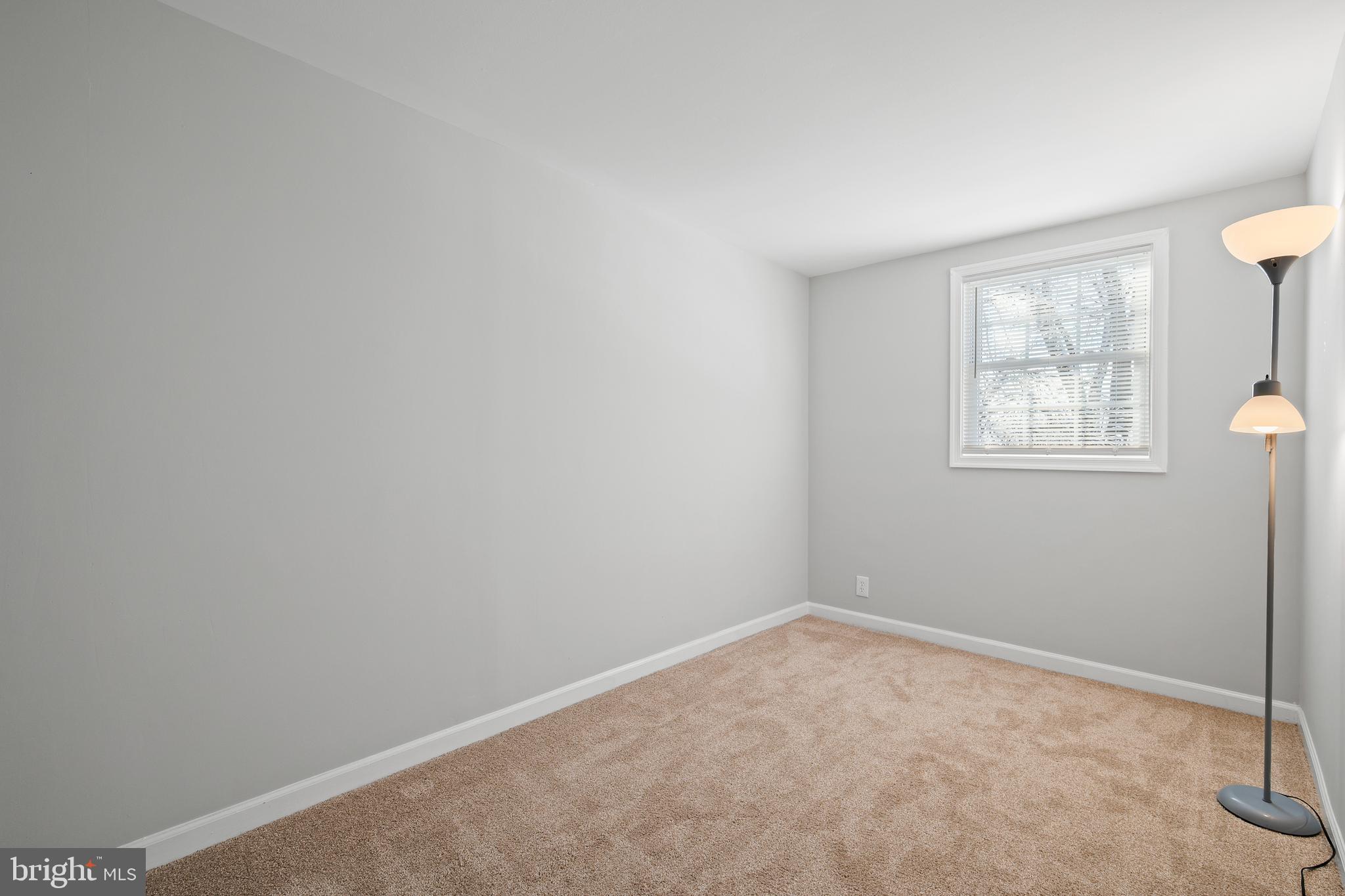 817 5th Baltimore, MD 21227 - Photo 20 of 29 an empty room with windows